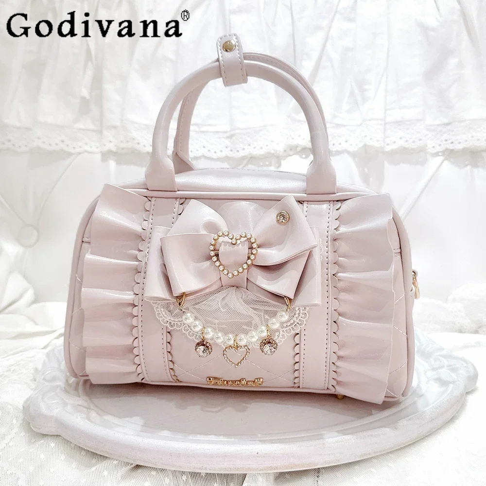 

Original Japanese Lolita Sweet Pink Princess Handbag 2026 New Girl's Bow Pearl Chain Handbag Shoulder Crossbody Bag for Women