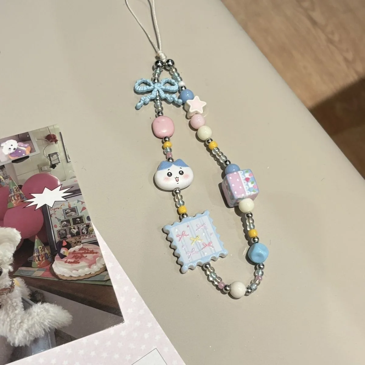 

Chiikawas Hachiware Beaded Phone Charm Cute Cat Character DIY Beaded Strap Kawaii Accessory for Phones & Cameras