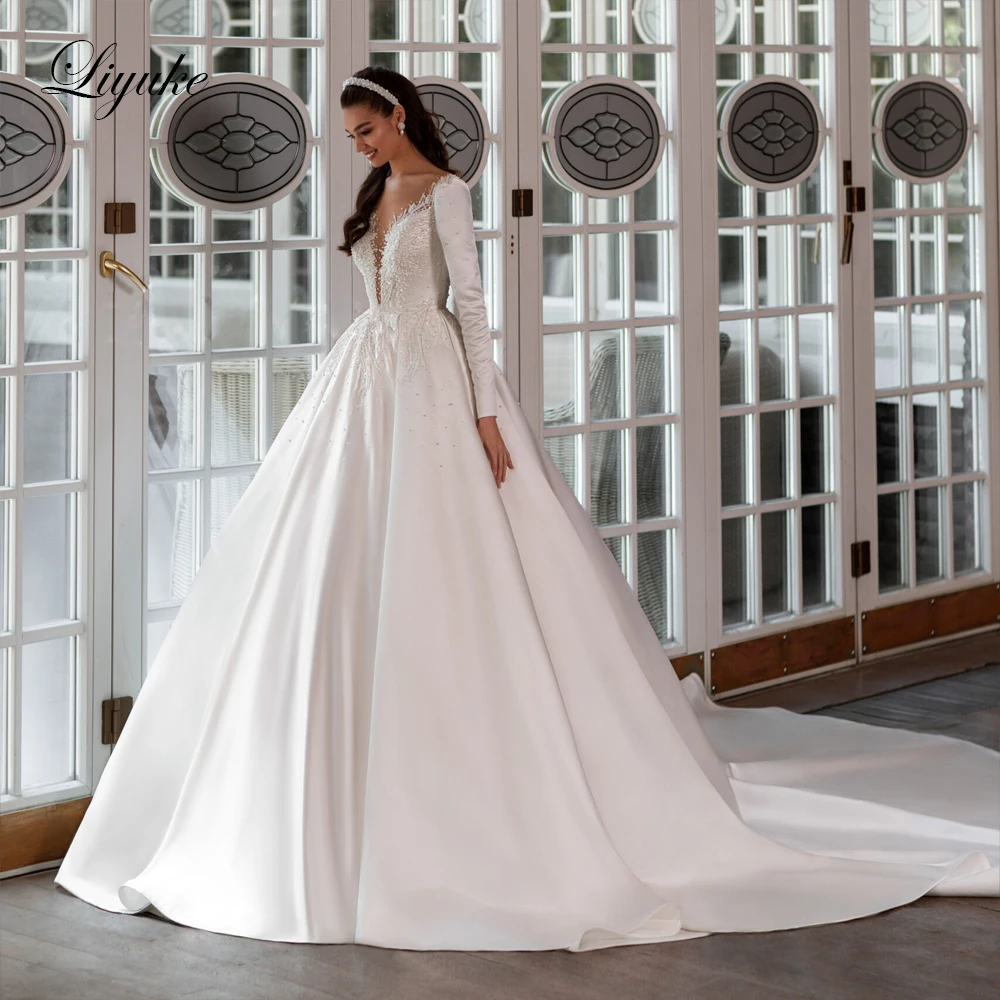 

Liyuke Luxuous Satin A-Line Wedding Dress Deep V-Neck Full Sleeves Beading Pearls Appliques Bridal Gown