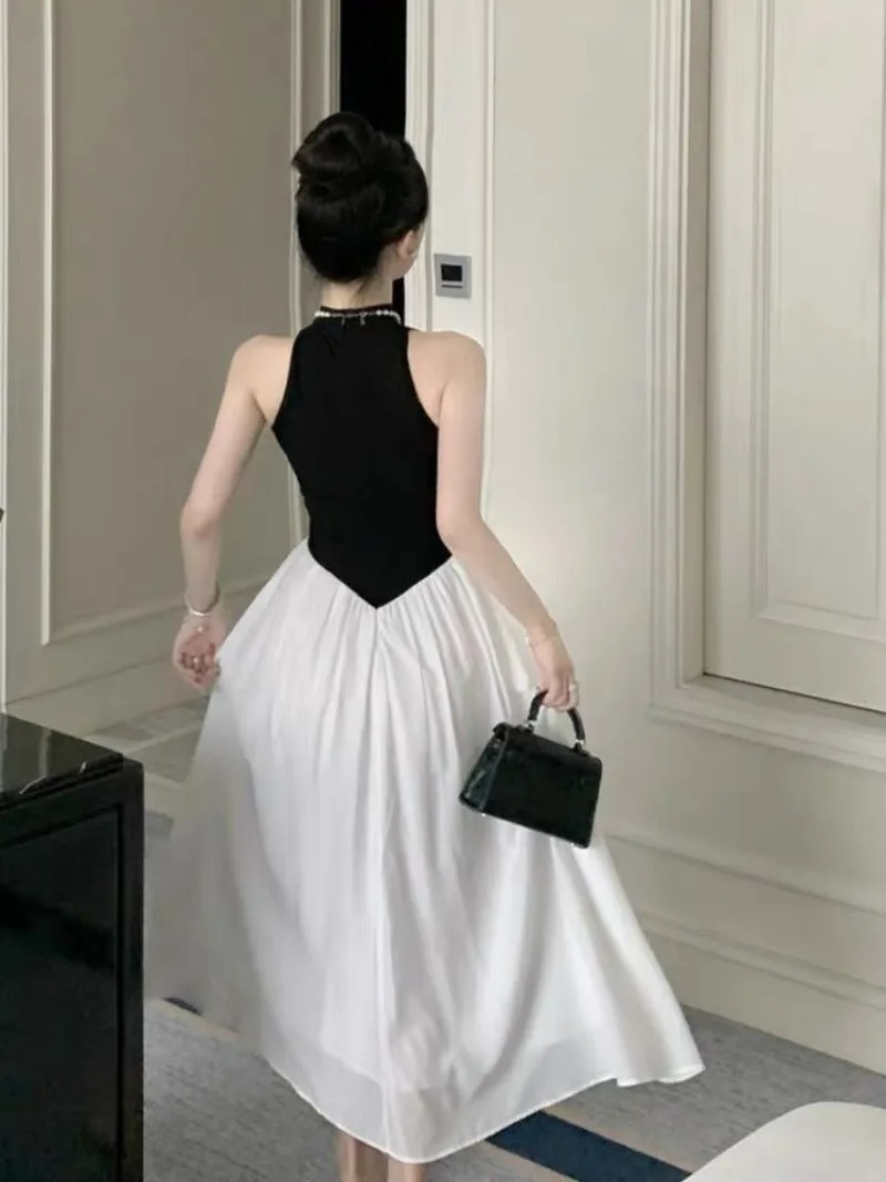 فساتين نسائية للعطلات ذات ألواح كبيرة عصرية ملابس الشارع الشهير على طراز الشاطئ موضة كورية بدون أكمام فساتين صيفية شعبية يوميًا