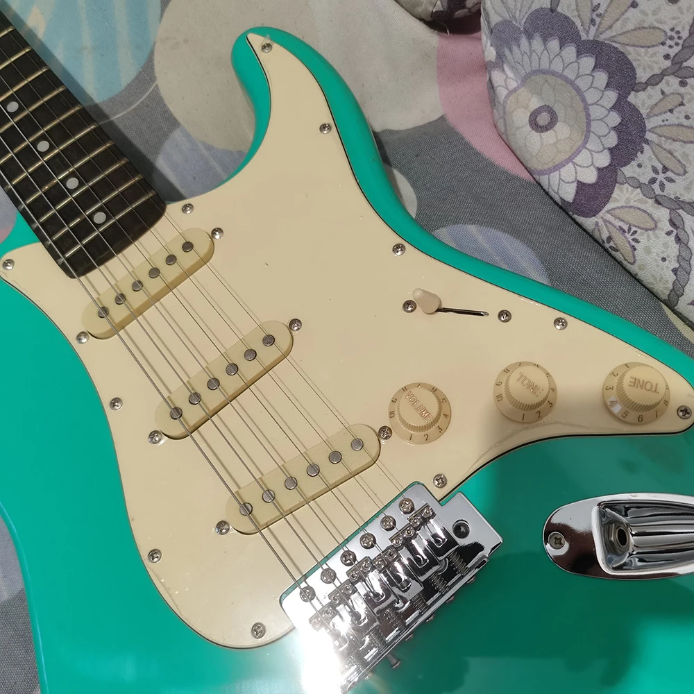 In stock surf green  guitar, retro pickup guard board, select the fastest shipping method according to the buyer's address