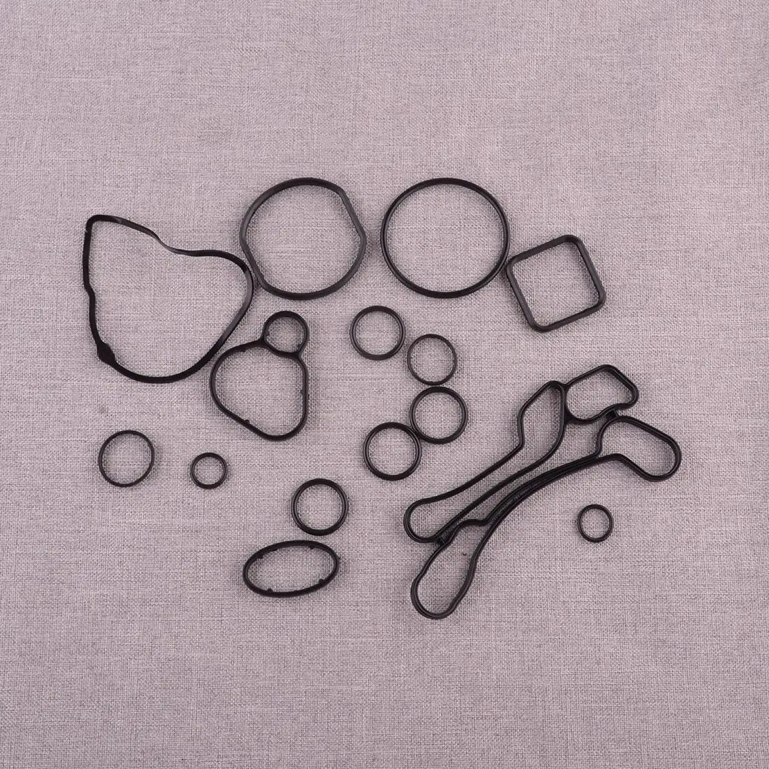 

55571687 55353322 55355603 15 шт./компл. комплект прокладок масляного радиатора двигателя, черная резина, подходит для Chevrolet Aveo Cruze Pontiac Saturn