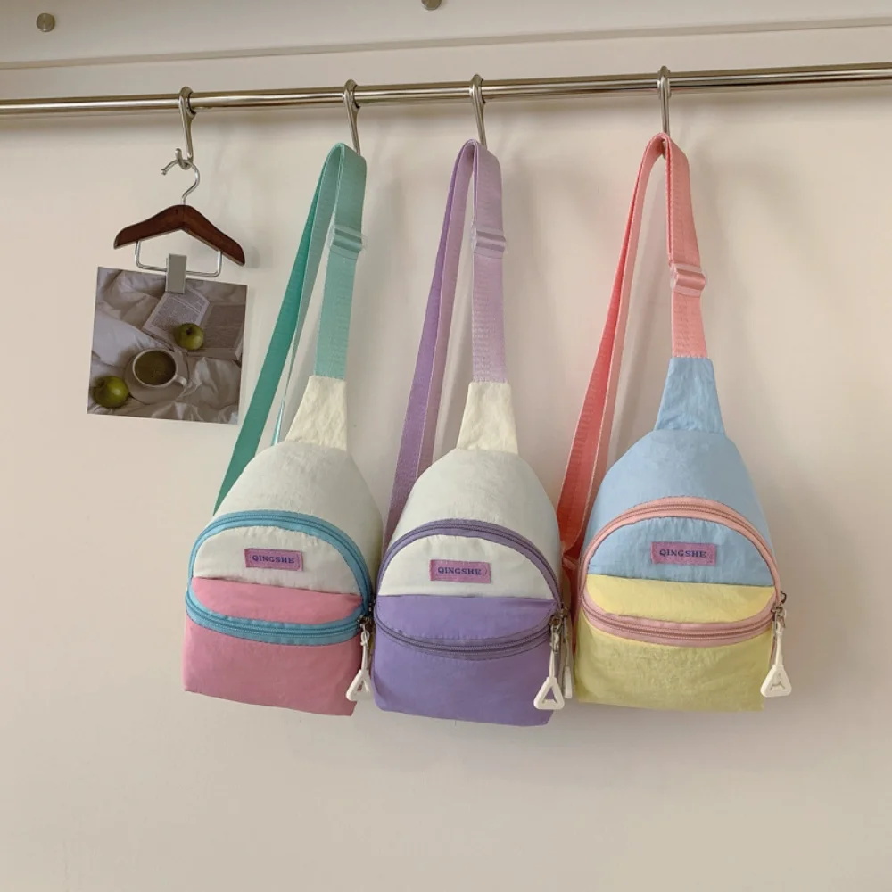 

Детская нагрудная сумка с героями мультфильмов, женская сумка через плечо, модная повседневная маленькая сумка для хранения цвета дофамина, универсальная дорожная сумка