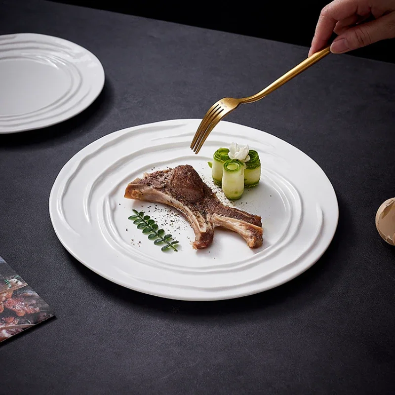 White Ceramic Wavy Western Food Plate Creative Irregular Pastry Dessert Round Flat Plate Table Setting in Hotel Restaurant