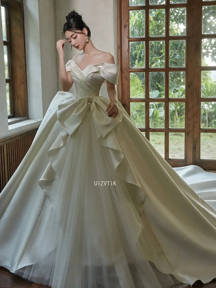 فساتين زفاف بيضاء فاخرة من الساتان للنساء 2026 فستاين سهرة/فساتين الحفلات بدون أكتاف وأربطة طول الأرض Vestidos De Novia مصنوعة حسب الطلب