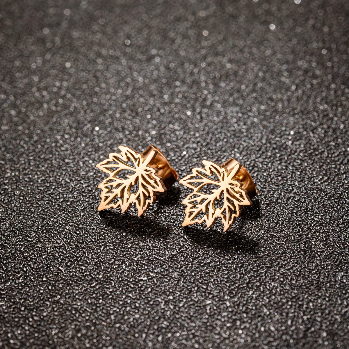 DIY accessories Autumn and winter new gold maple leaf stud earrings ins stainless steel simple hollow fashion niche personality