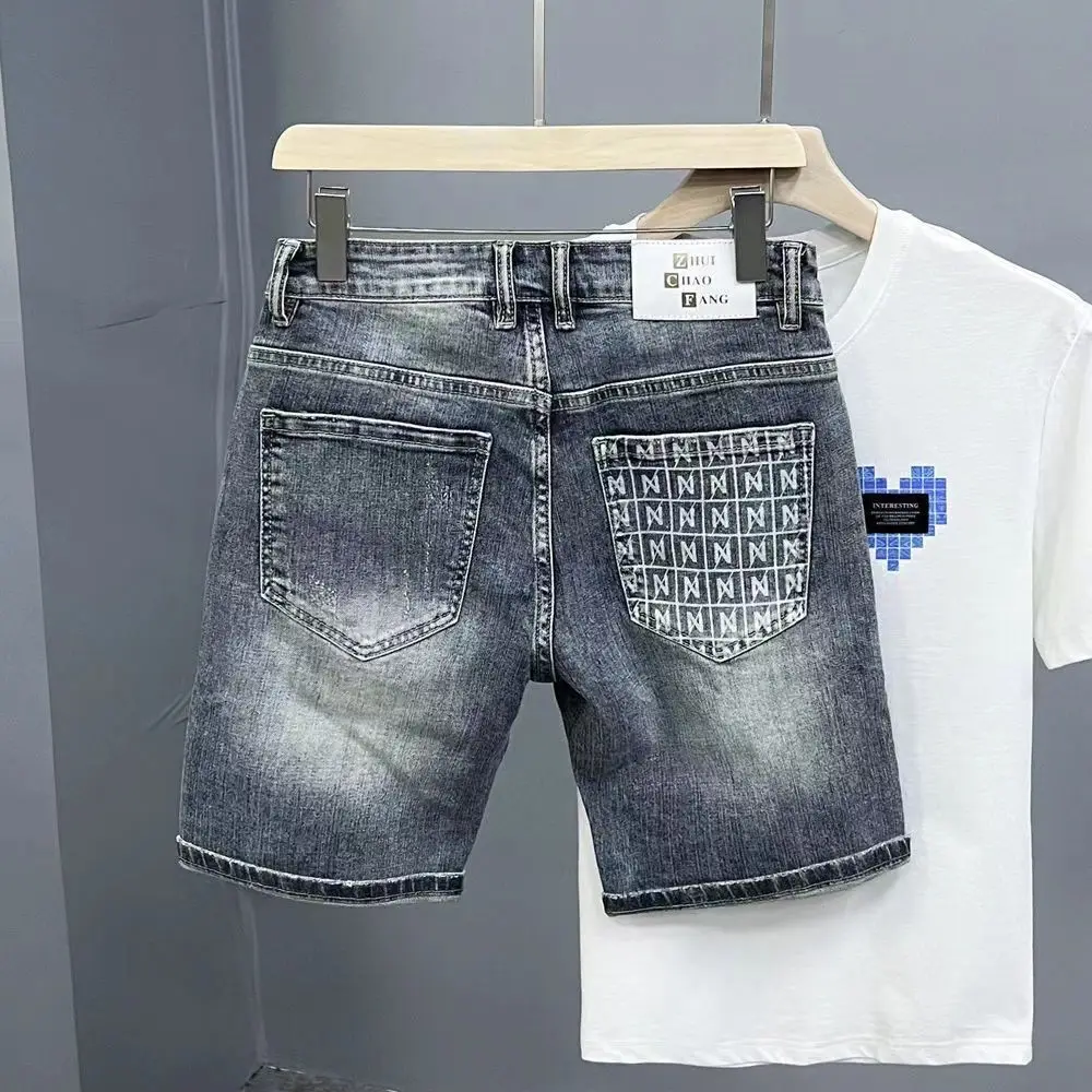 Męskie letnie ubrania uliczne markowe ubrania nadruk w stylu vintage spodenki jeansowe do kolan dla mężczyzn rozciągliwe i oddychające dżinsy codzienne