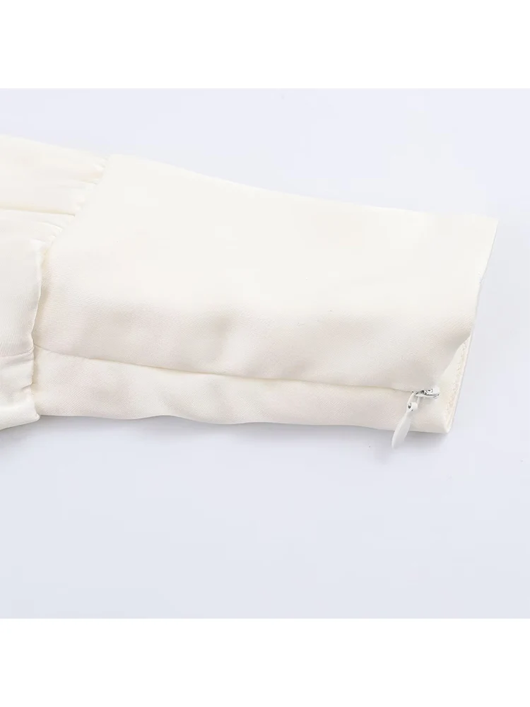 Bluzka damska TFMLN na jesień, z kokardą przy dekolcie, długie rękawy, dopasowany krój, elegancki styl, seksowny odkryty tył, koszula damska.