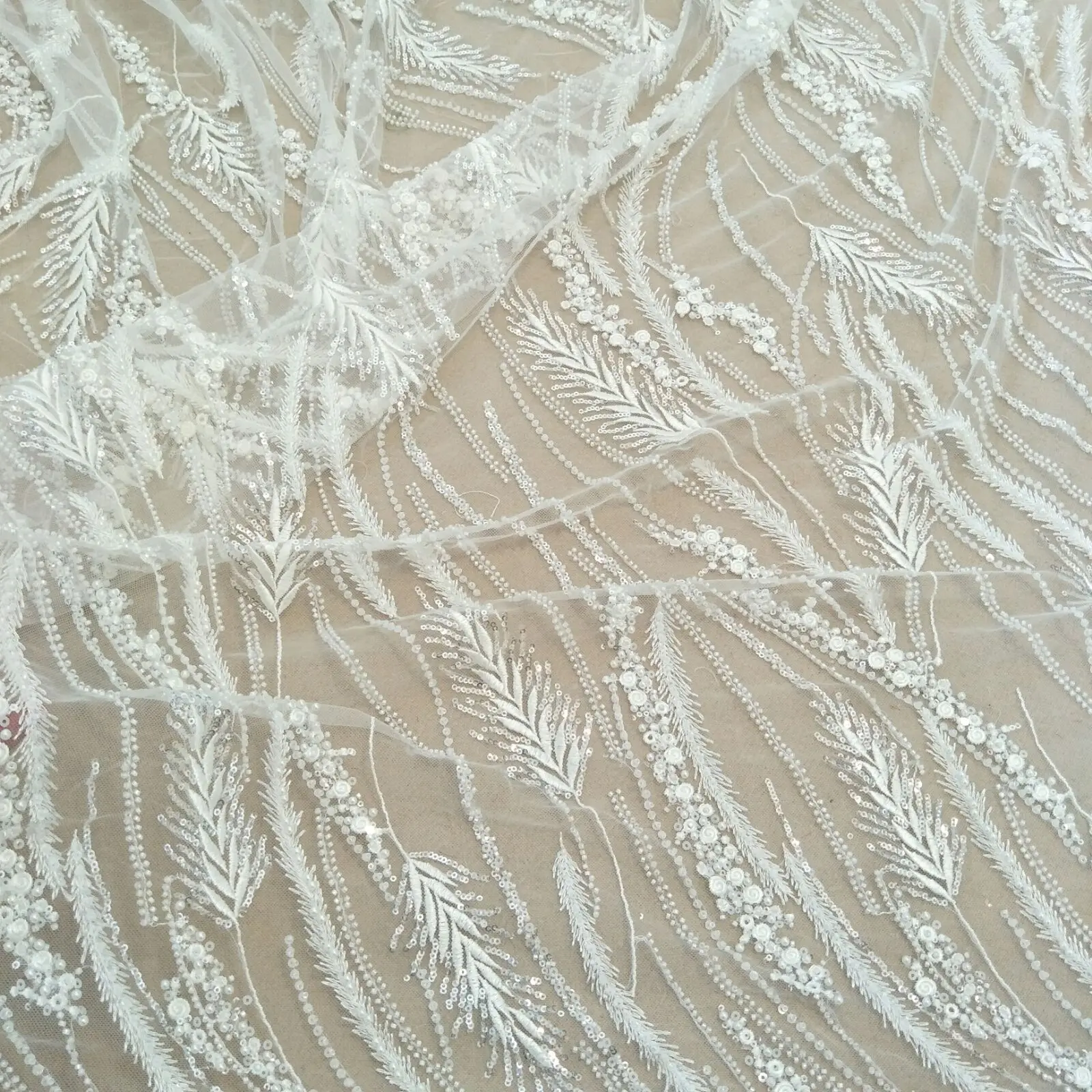 new arrival wedding gown dress lace fabric with beads and sequins lace pearls ivory lace sell by yard