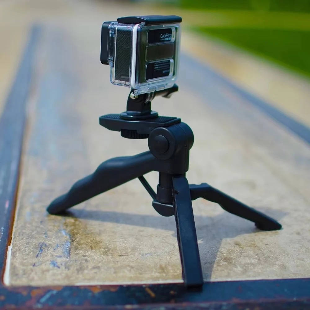 مسدس مع كاميرا عمل لولبية 1/4-20، تتضمن محول GoPro. ترايبود صغير ومونوبود. رفيق الكاميرا المدمجة للغاية، 1/4-20