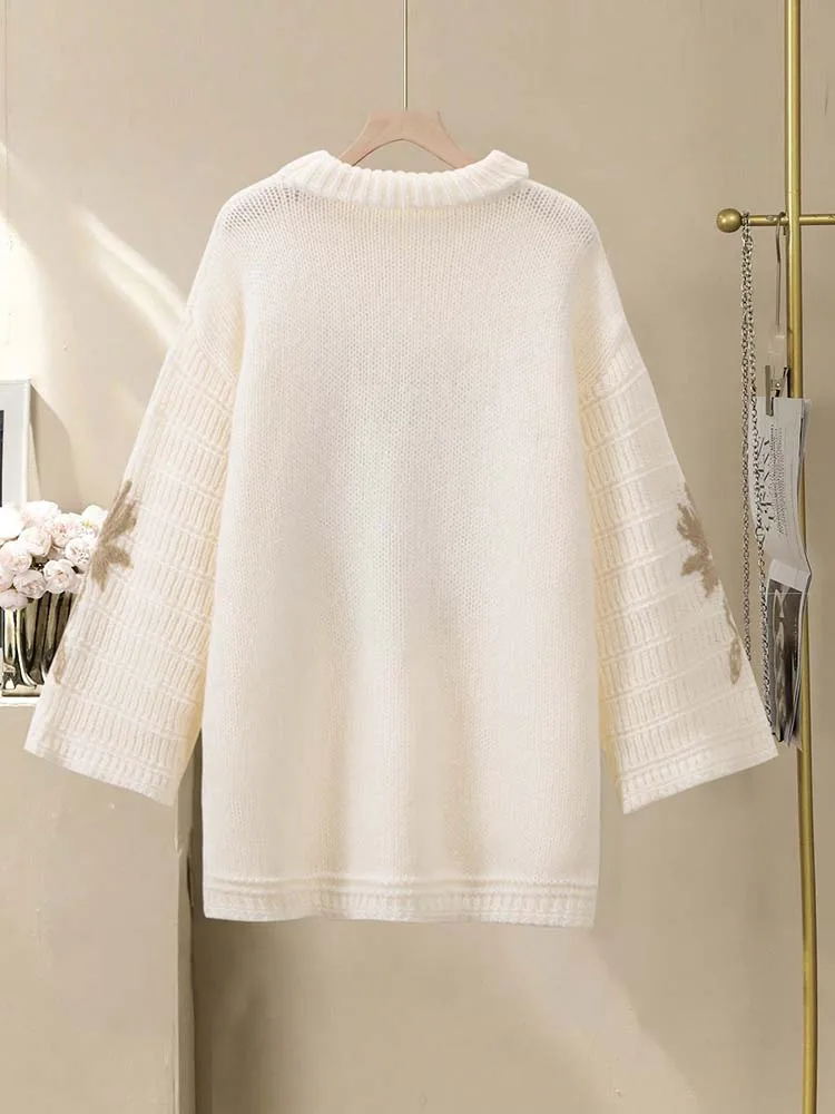 Top lungo da donna in maglia autunnale e invernale con colletto impilato, maniche dritte e design con ricami floreali