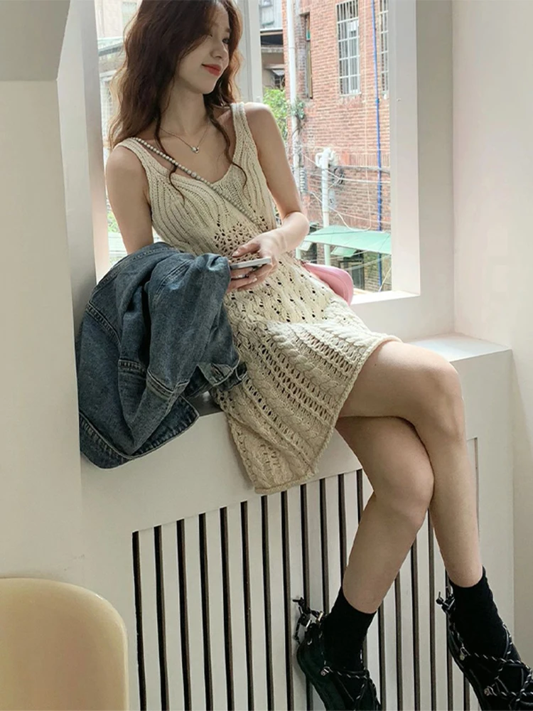 

2024 Summer Fashion Hollow Ice Silk Knitted Dress V-neck Solid Color Design Feeling Slim Women's Slim Sling Short Skirt L252