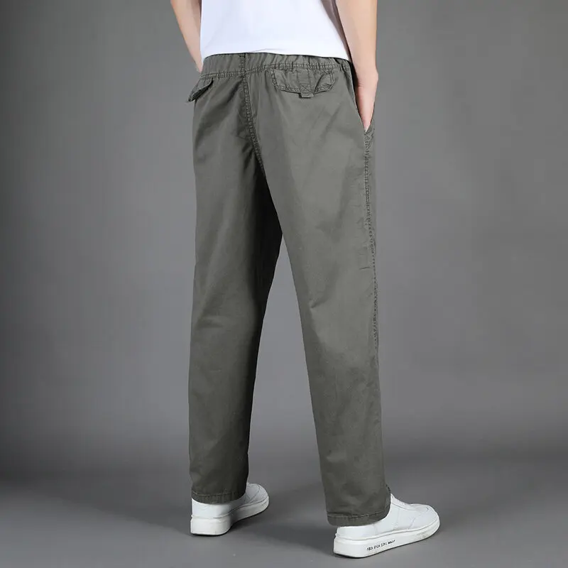 Pantalones casuales versátiles de algodón puro para hombres, bolsillos con cordón empalmados elásticos lavados, moda de Color sólido, primavera y otoño