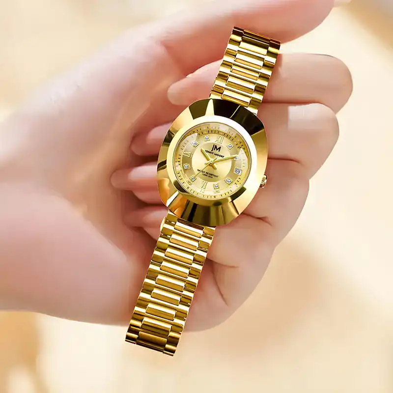 JONNY MOORE 8561 ساعة كوارتز ذهبية عصرية للنساء مع تصميم تاريخ تلقائي ساعات رائعة بحزام فولاذي للنساء Reloj Mujer