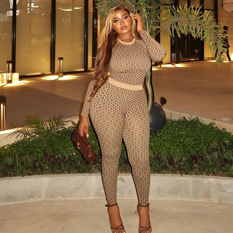 จั๊มสูทผู้หญิงซิสเตอร์สตาร์แฟชั่นสลิมฟิตยืดพิมพ์ลายคอกลมแขนยาวชุดจั๊มสูทลำลองสำหรับเดินทางที่ดูสง่างาม