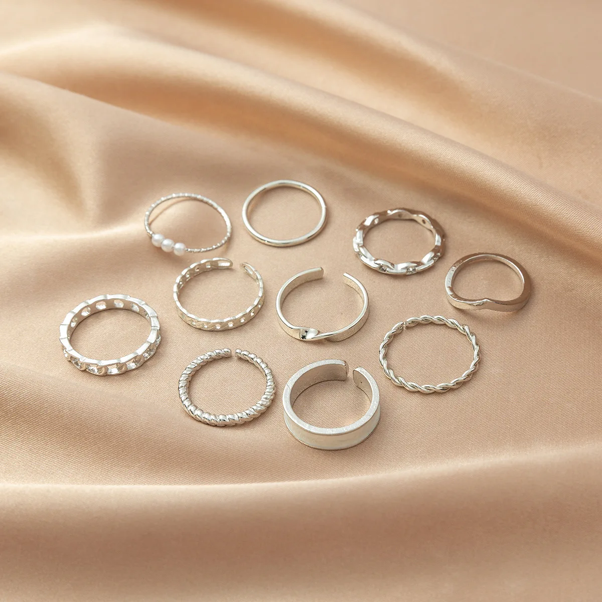 Cross-border European and American Express retro alloy twist pearl ring 10-piece set, hollow simple open ring