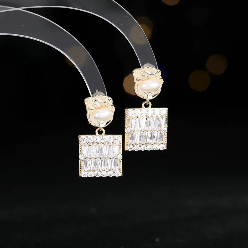 

New high-end earrings s925 silver needle simple zircon versatile white-collar delicate geometric pearl stud earrings for women