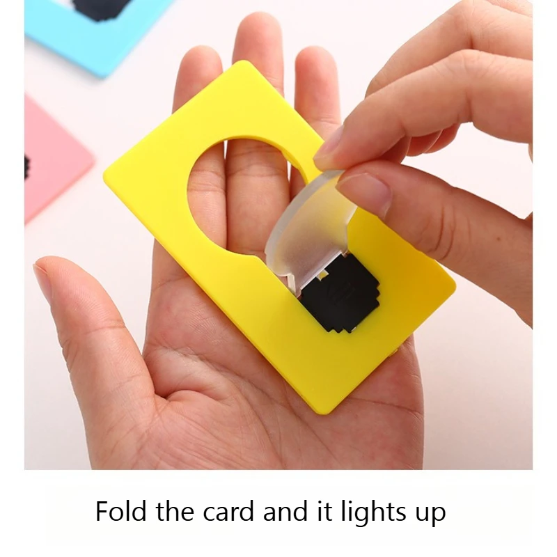 Mini luminous folding card led reading night light, creative and portable, mobile phone holder