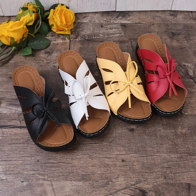 

Bow flat bottom hollow slippers slope heel slippers fish mouth solid color large size