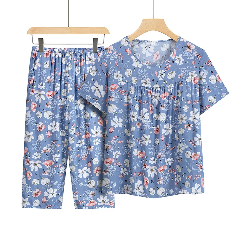 

2024 Printed Round Neck Summer Women's Short Sleeved Top Fashion Versatile Loose High Waist Elastic Split Pant Two-piece Suit