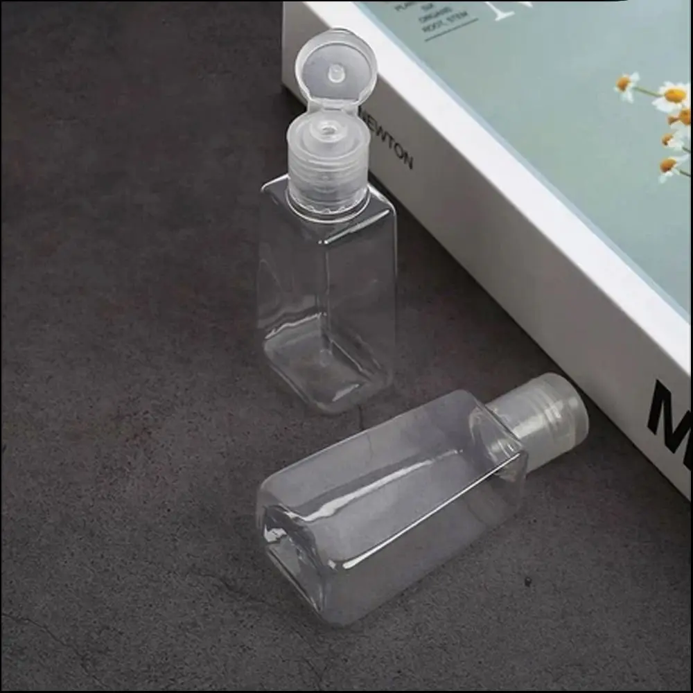 Nuovo 30/60ml Bottiglia Vuota Riutilizzabile Tappo di Vibrazione Bottiglia Da Viaggio Bottiglie di Plastica Trapezoidale Lozione Cosmetica Portatile Spremere Bottiglie