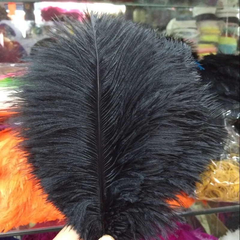

Wholesale natural Hard rod 100pcs/lot black Ostrich Feathers 20-25cm / 8-10" Wedding Birthday Christmas Decorations