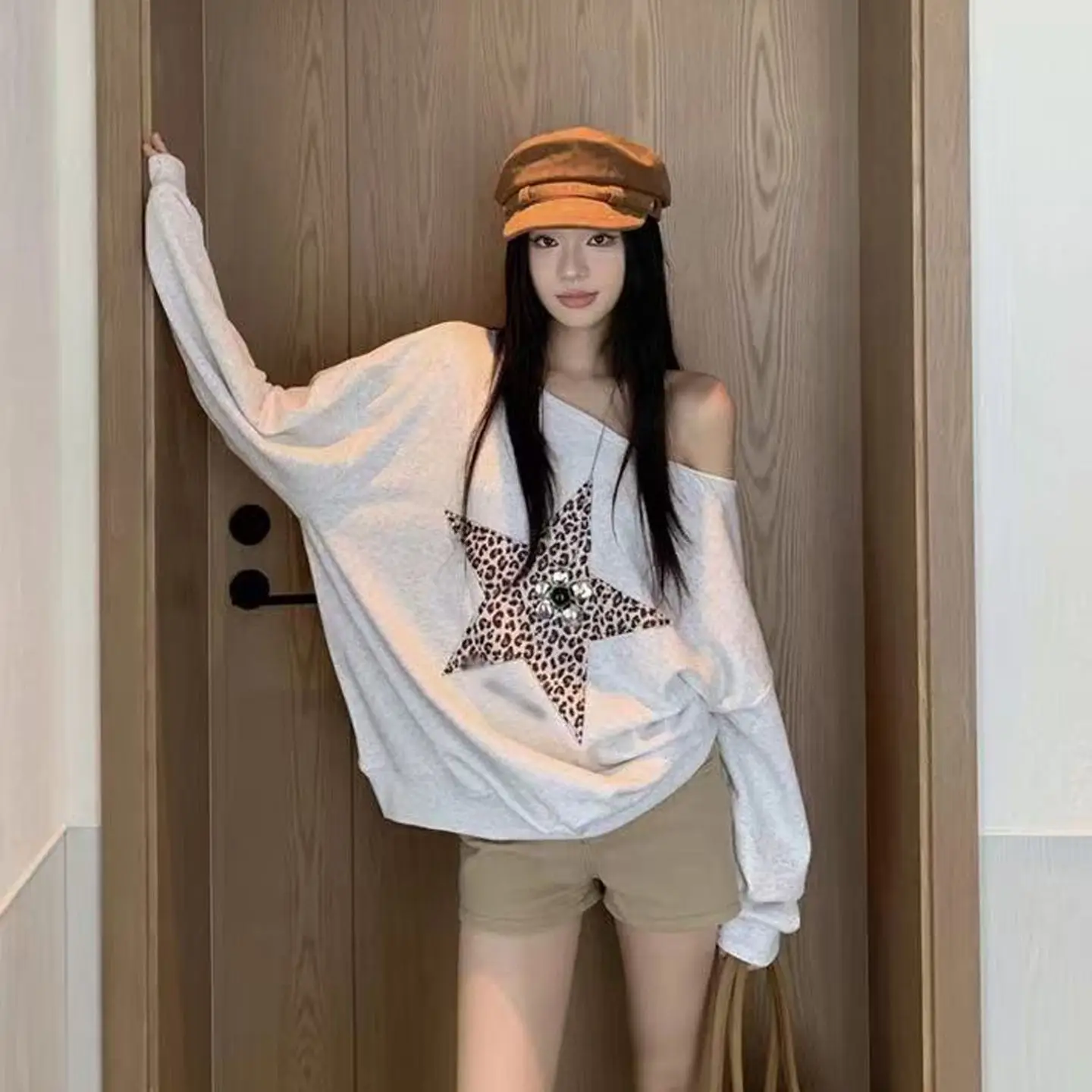 Sudaderas de principios de otoño para mujer, jersey Retro americano con hombros descubiertos, Top de manga larga, Sudadera con capucha con estampado de leopardo