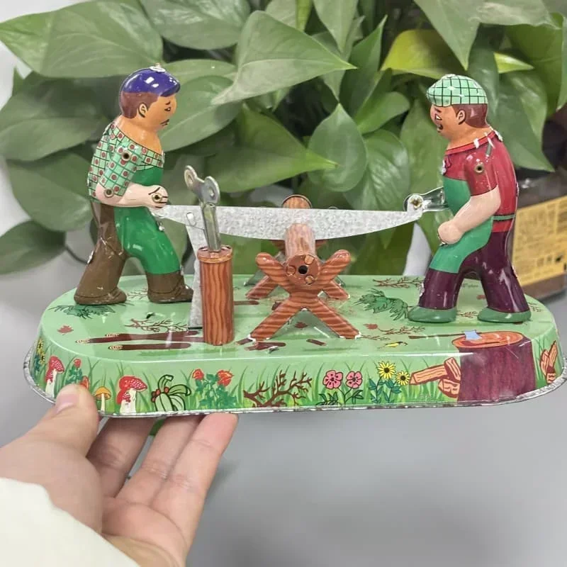 

Clockwork Toy Metal Tin Sawing Woodworking Sawyer Fun Metal Tin Woodcutting Machinery Toy Wind Up Toy Gift