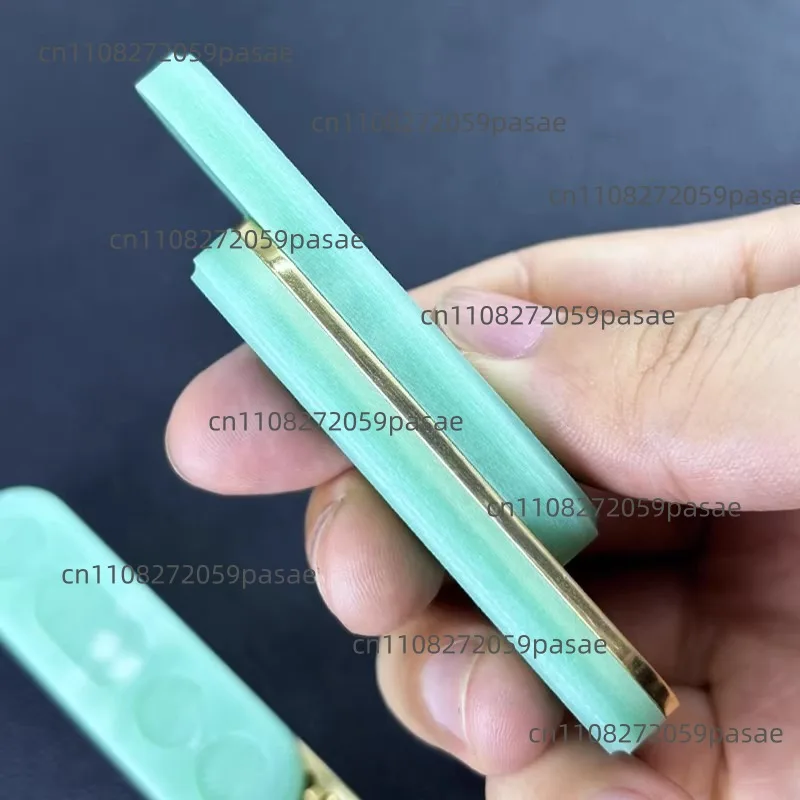 Mechanical decompression artifact fingertip gyro push card