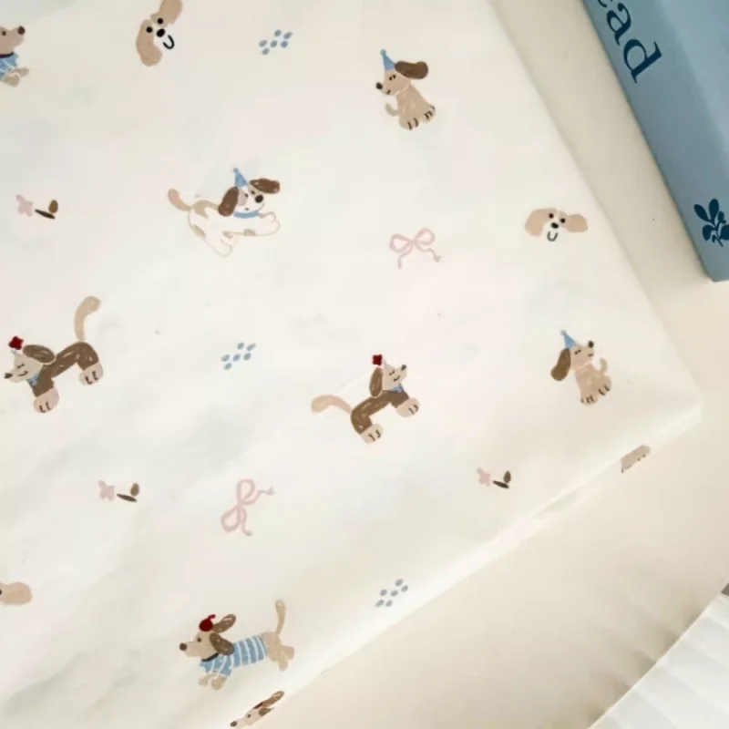 

White dog print fabric, used for handmade bags, clothing, and other fabrics.