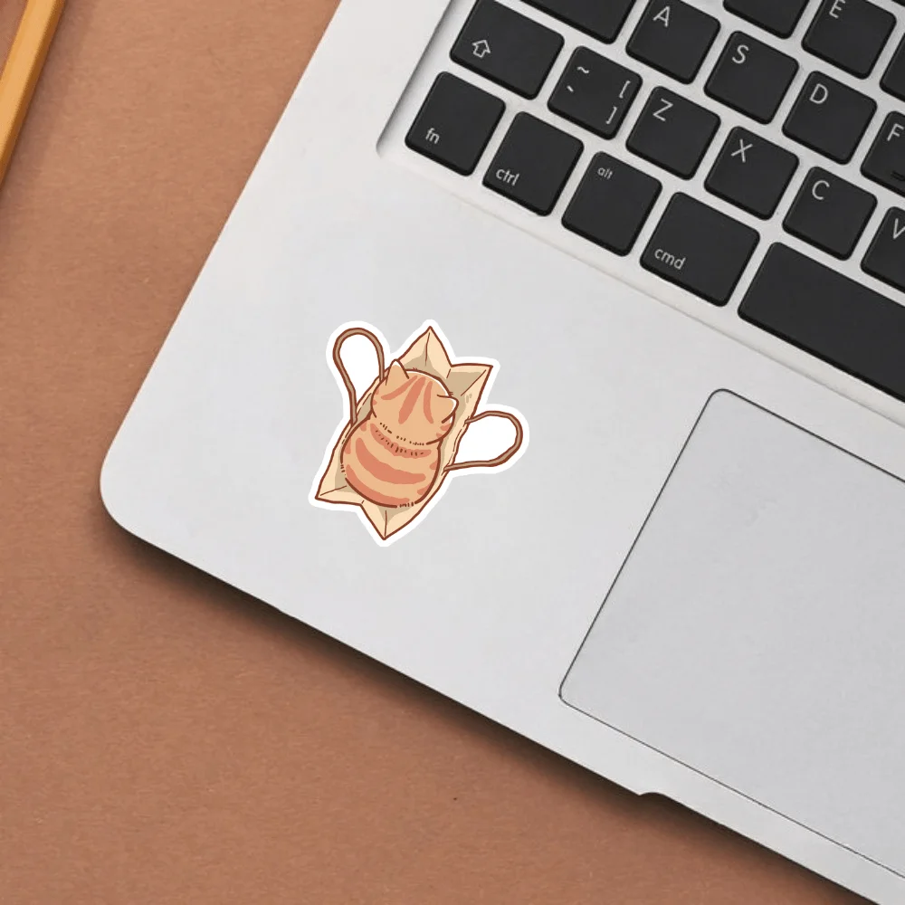 The orange cat in the bag is soft and cute, featuring a 