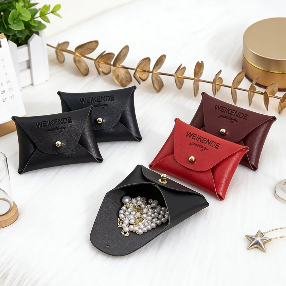 

50Pcs High Quality Black PU Leather Jewelry Storage Bag 7x5cm Fashion Earrings Necklace Ring Buckle Jewellry Packaging Snap Bags