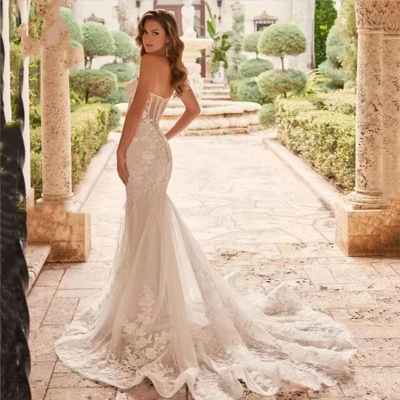 Abiti da sposa personalizzati Sixy a sirena Abiti da sposa senza maniche con applicazioni in pizzo Abiti da sposa con scollo a cuore Abiti da sposa