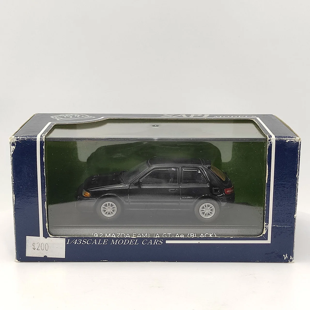

Дефект поверхности краски, литой под давлением, масштаб 1:43, SAPI 1992, Mazda Familia GT-Ae, черный сплав, модель автомобиля, Коллекционная игрушка, подарок, сувенир