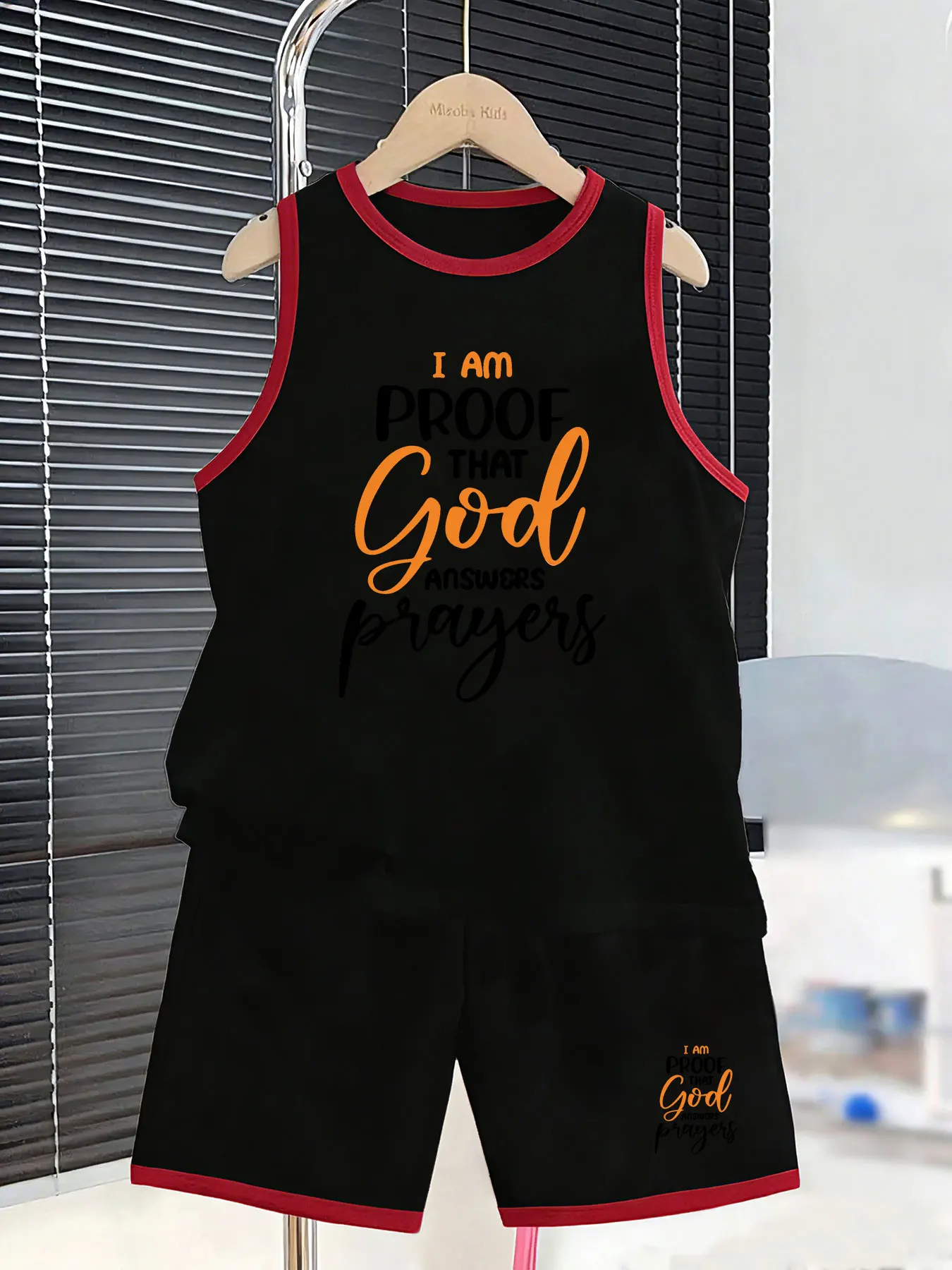 Two-piece set of slogan-themed vest and shorts for boys, creating a healing summer outfit. Selected breathable and skin-friendly