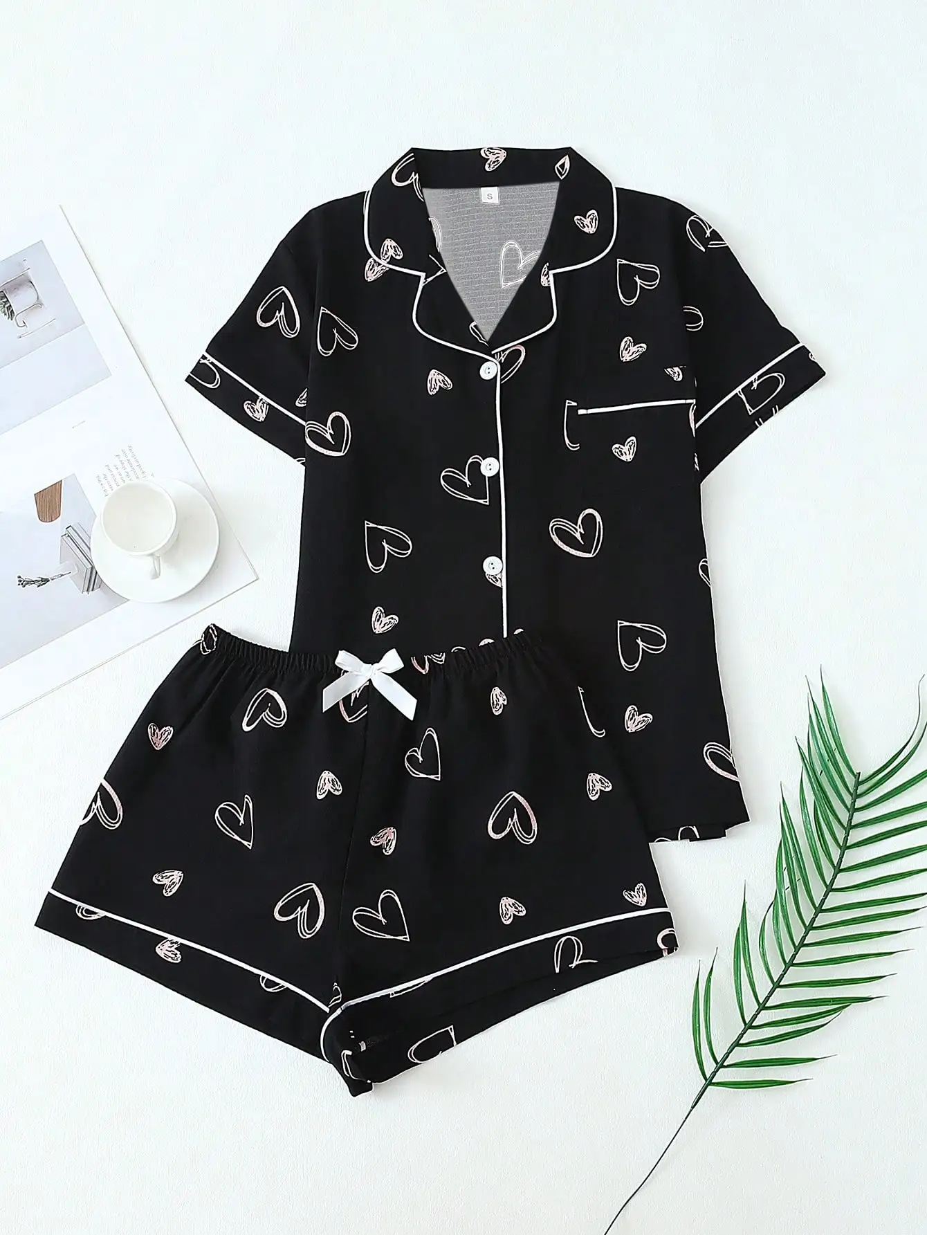 

Black Heart Print Pajama Set with Contrast Piping and Bow Detail