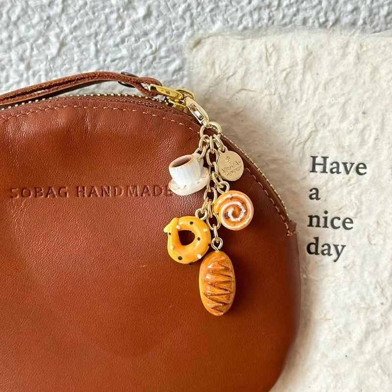 

Simulated Food Series Mini Keyrings Hand-painted Croissant and Coffee Design Charm Keychain Mini Bread Resin Keychain Wholesale