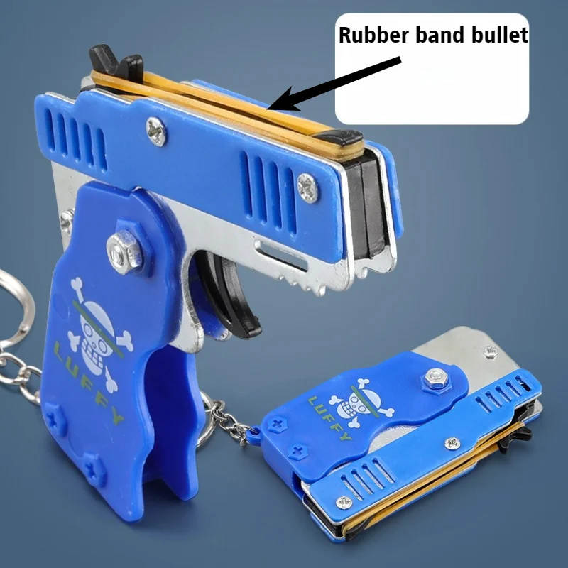 Rubberen bandpistool Kinderspeelgoed Coole sleutelhanger Mini metalen opvouwbare schietpistool Rubberen launcher Speelgoedcadeaus met 60 elastische decoraties