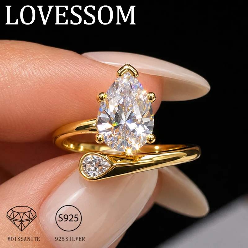 A simple, unisex 925 sterling silver, 2-carat moissanite teardrop-shaped ring, designed for couples with an adjustable opening.