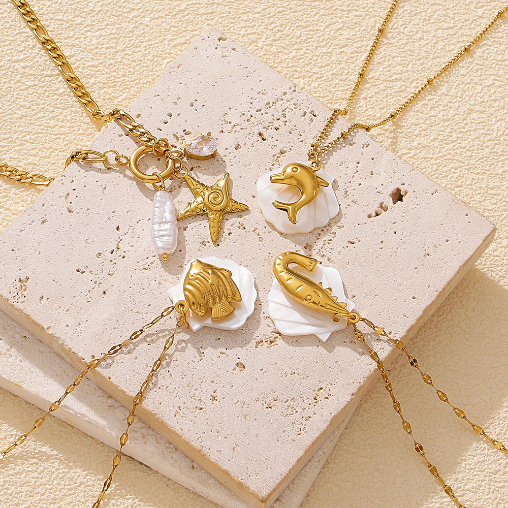 

Freetry 7 Styles Stainless Steel Starfish Dolphin Scallop Pendant Necklace for Women Boho Waterproof Gold Color Stacked Necklace