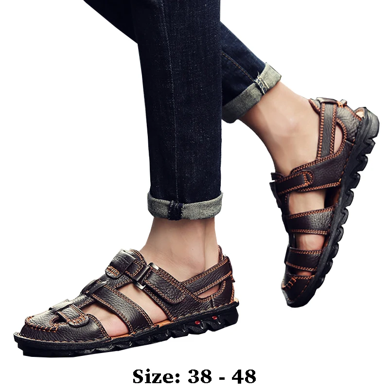 

Высококачественные кожаные сандалии на плоской подошве для мужчин с круглым носком, новинка лета 2025 года, размер 38 48, повседневная обувь для прогулок на открытом воздухе, большие размеры, черный, коричневый