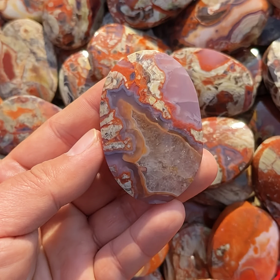 1 Piece Natural Money Agate Palm Stone – Featuring Unique Red and Yellow Veining. It Is a Wonderful Piece for Home Decoration