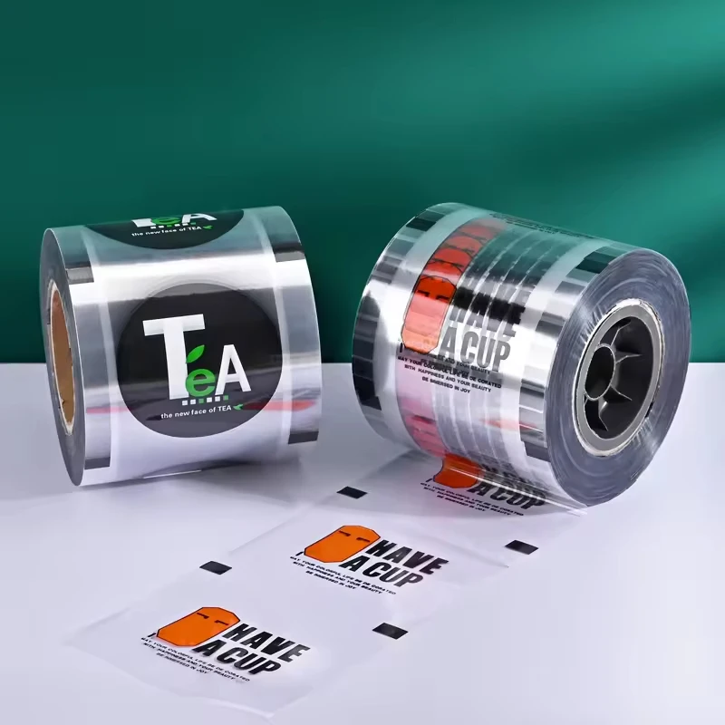 Calibro 90/95 Figura di cartone animato Logo stampato Pellicola sigillante per tazze Tè al latte Tazza di plastica Pellicola sigillante per latte di soia Un rotolo di rilegatura