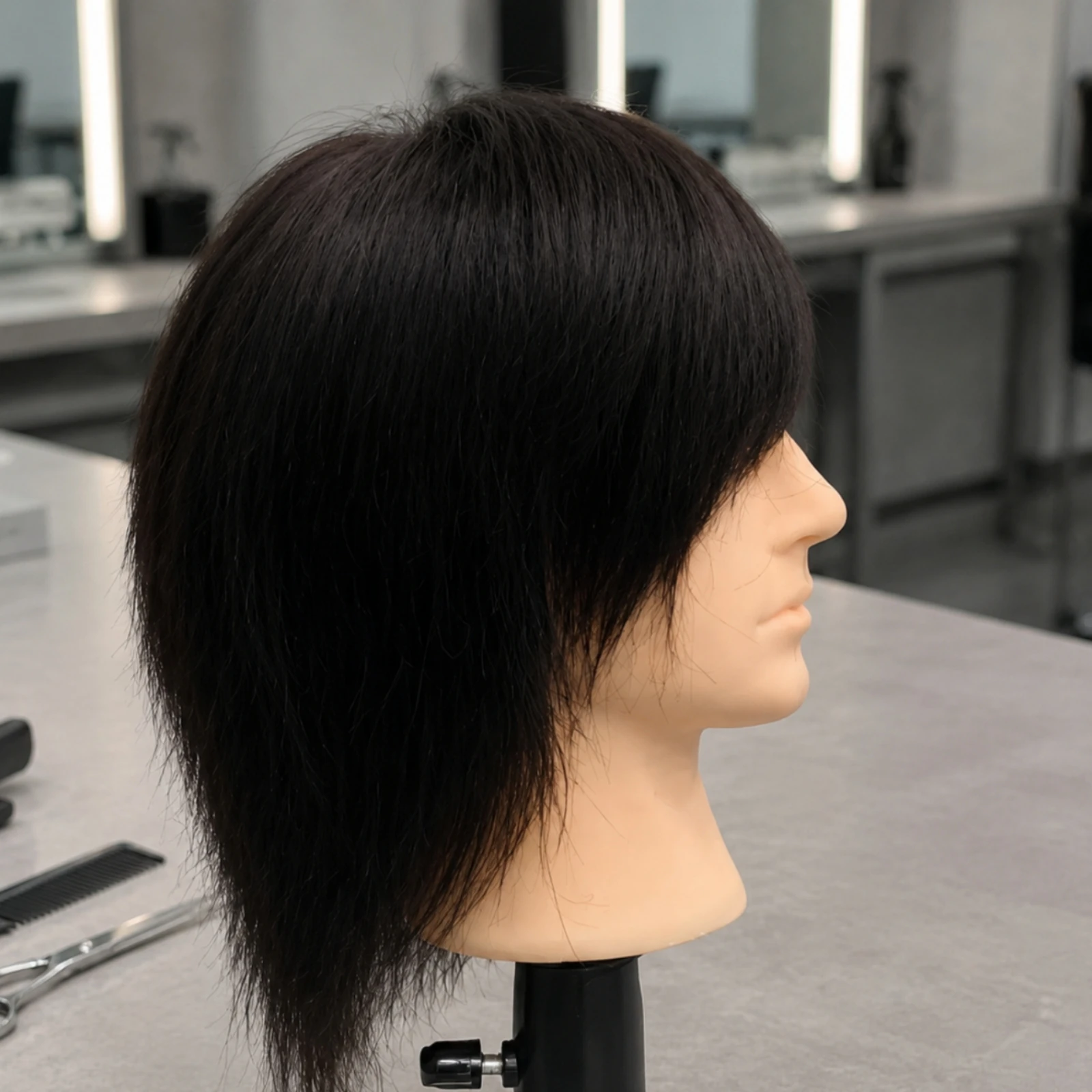 男性用ヘアスタイリングマネキンヘッド。回転式で、本物の人毛を使用。理髪店向けに、化学的に消毒・洗浄済み。