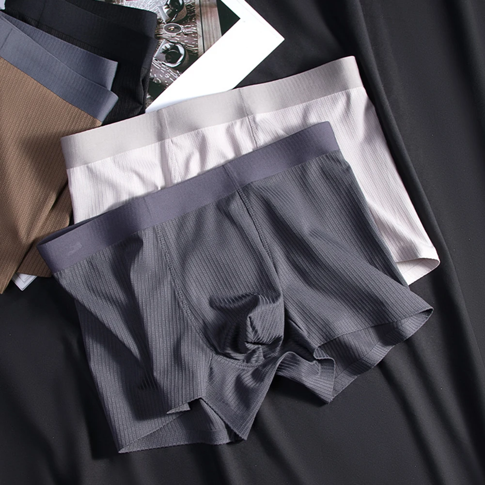 

Men's ice silk breathable boxers with pouch quick drying seamless underpants designed for comfort elasticity and everyday use