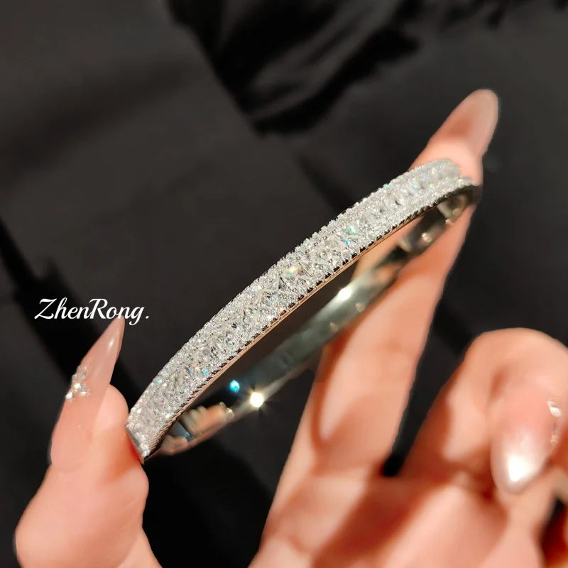 A luxurious and colorful bracelet, studded with micro-set high-carat diamond zircons, and equipped with a spring clasp. Women's