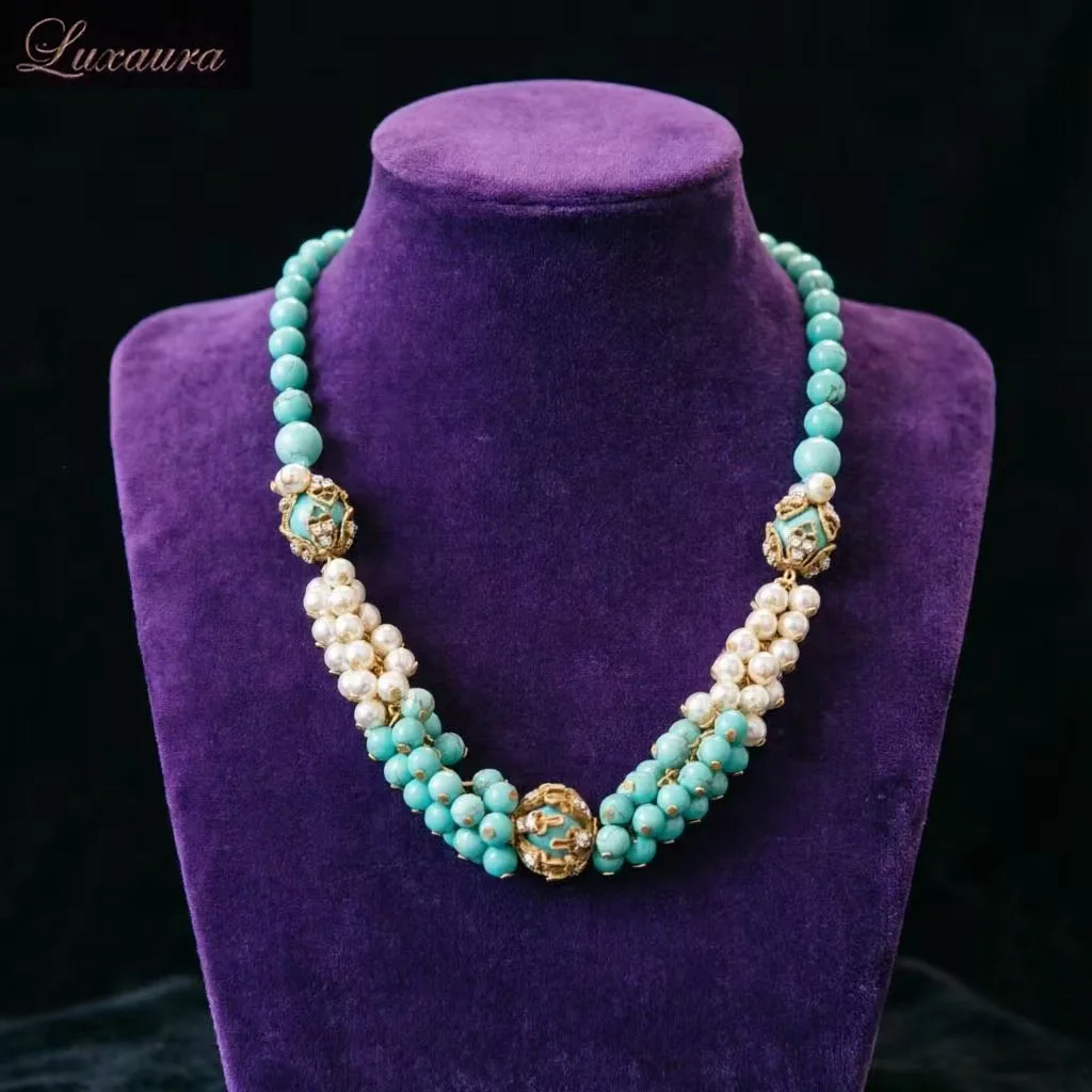 

Vintage jewelry featuring a fashionable and classic blue geometric necklace design paired with Bohemian style women's necklace