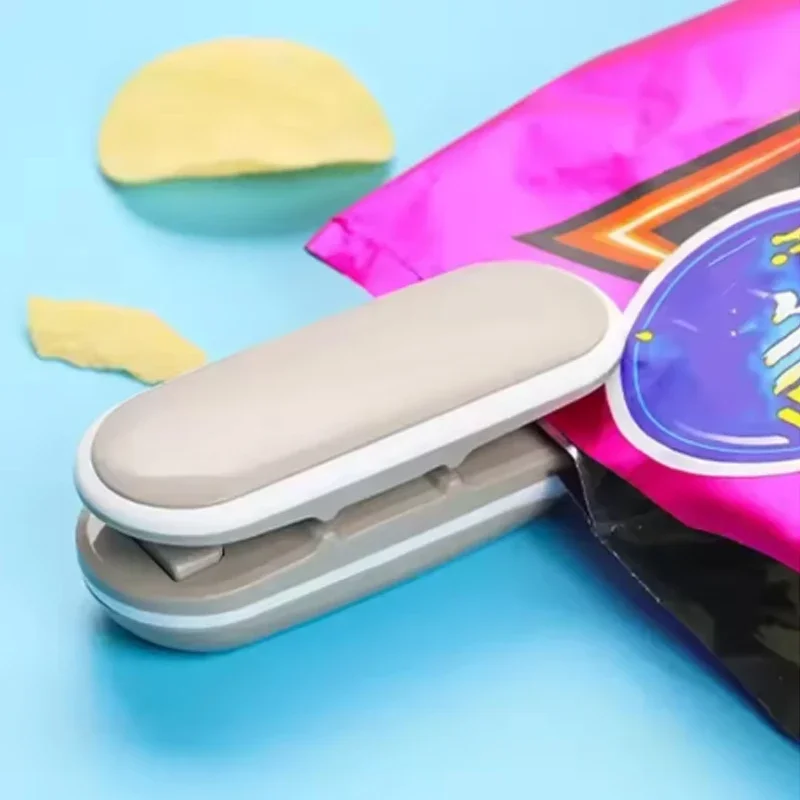 Mini thermoscelleuse Portable pour collations, scelleuse de sacs en plastique portative avec fonction de pression, accessoires de stockage d'aliments pour la cuisine domestique