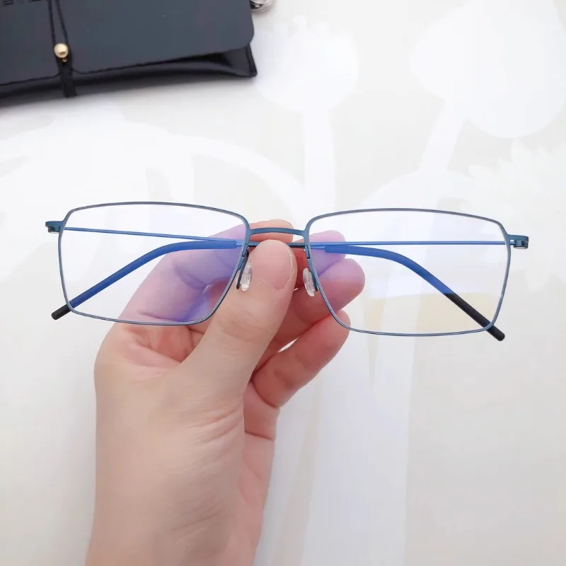 Ultra-thin Ultra-light Pure Titanium Box Men and Women Fashion Thin Leg Thin Frame Myopia Glasses New Optical Frame Business.