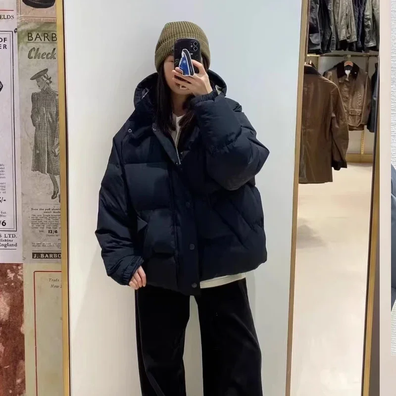 OS Down Transport Lose Daunenjacke